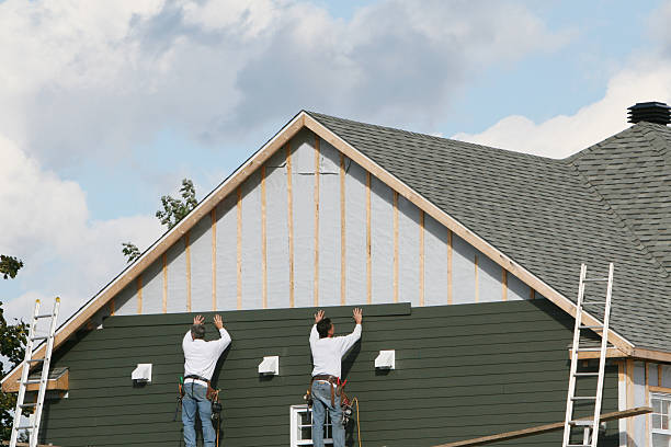 Professional Siding Repair technician working in Manor, TX